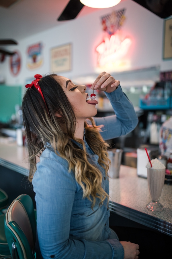 girl eating cherry
